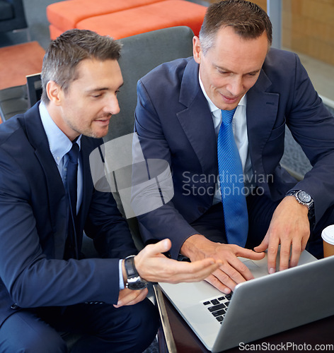 Image of Laptop, corporate lounge and business people consulting on portfolio review, stock market database or investment. Financial economy, partnership and trader teamwork on forex, bitcoin or nft trading