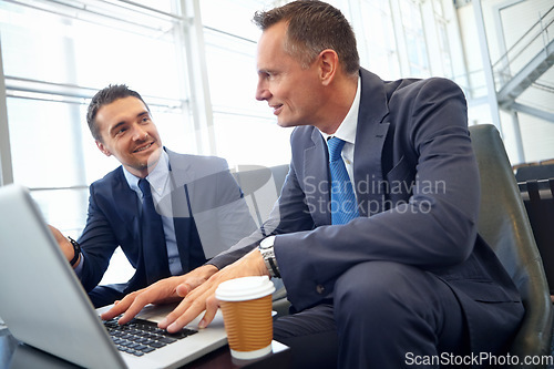 Image of Planning, laptop and businessman with partner meeting in lobby for digital, website or online company strategy. Corporate business people with management ideas for finance, stock market or investment