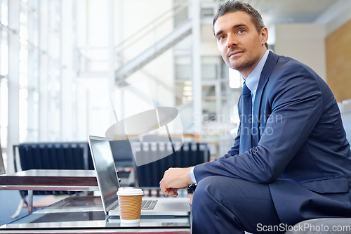 Image of CEO or business man thinking in airport with laptop for invest strategy, stock market finance or financial review. Corporate professional waiting on sofa with tech doing research on economy