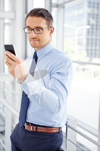 Image of Corporate, planning or business man with phone for invest strategy, finance growth or financial review. Manager thinking in office building for social media, data analysis or economy data research