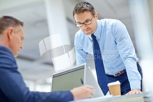 Image of Office laptop, team and businessman reading portfolio review, stock market database or investment. Economy, research colleague and online trader work on finance exchange, crypto mining or NFT trading