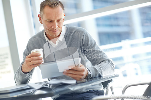 Image of Thinking, corporate or business man with tablet in office for communication, social networking or content blog review. Coffee, research or manager with tech for social media, mobile app or web search