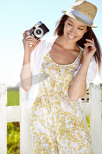 Image of Photographer, camera or travel influencer in holiday location, summer vacation or Germany sightseeing break. Smile, happy woman or vlogger photography equipment for tourist nature or blogging review