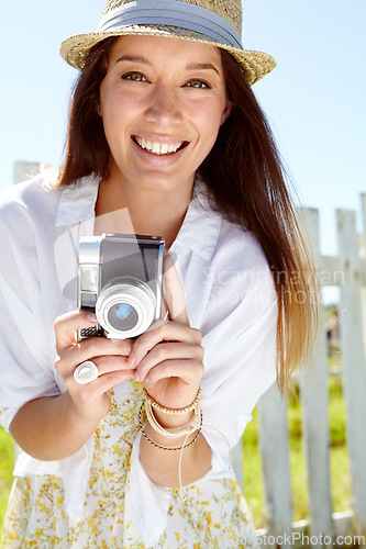 Image of Woman portrait, photographer or vintage camera in holiday location, summer vacation or Germany sightseeing break. Smile, happy or travel blogger with photography equipment for tourist nature review