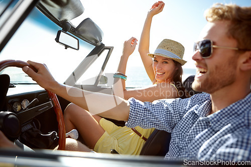 Image of Car road trip, travel and happy couple laughing on holiday adventure, transportation journey or fun summer vacation. Love bond, convertible vehicle and male driver, man and woman driving in Canada