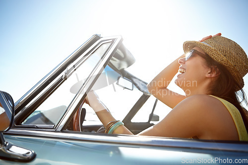 Image of Woman, road trip and smile for summer journey, freedom or travel vacation in the sunny outdoors. Female smiling and driving in happiness for traveling, holiday or getaway with sunglasses and hat