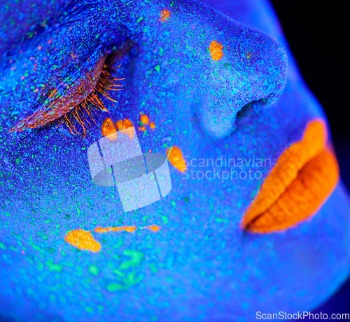 Image of Neon paint, makeup zoom and woman face with black background and creative cosmetics. Glow beauty, fantasy and psychedelic cosmetic of a female model with unique and creativity with art in studio