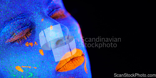 Image of Neon paint, unique makeup and woman face closeup with dark background and creative cosmetics. Glow, fantasy and psychedelic cosmetic of a female model with mockup and creativity with art in studio