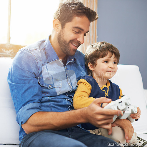 Image of Love, father and son with video game, happiness and gaming at home, loving or smile. Family, male parent or dad with a kid, boy or child with technology, bonding or quality time with games or playing