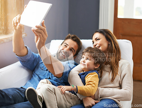 Image of Smile. Selfie, tablet and happy family on video call in a home together using social media on the internet or online. App, website and parents with kid or child in happiness and smile for a picture.