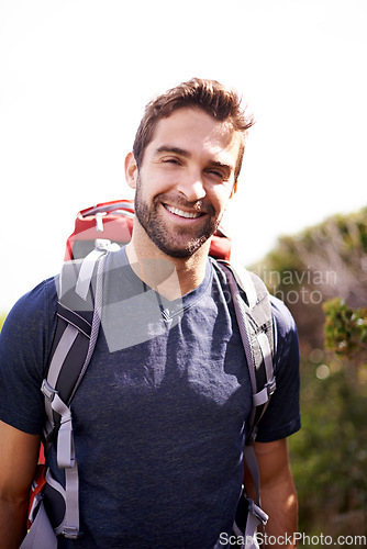 Image of Hiking, travel and portrait of man on mountain for fitness, adventure and journey. Backpack, summer and face of with male hiker trekking in nature path for training, freedom and explore