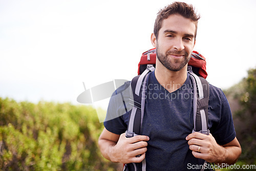 Image of Hiking, nature and portrait of man on mountain for fitness, adventure and travel journey. Backpack, summer and workout with face of male hiker trekking on path for training with mockup space