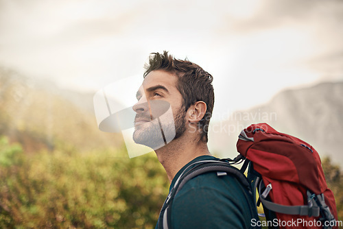 Image of Hiking, relax and thinking with man on mountain for fitness, adventure and travel journey. Backpack, summer and workout with male hiker trekking in nature path for training, freedom and explore