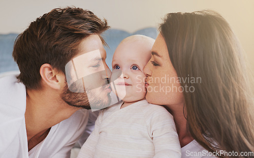 Image of Happy father, mother and kiss baby on cheek for love, care and quality time to relax together in family home. Mom, dad and kissing cute newborn kid for happiness, loving support or infant development