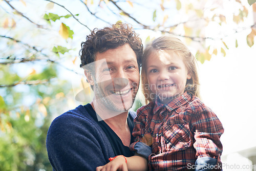 Image of Happy, portrait and father with daughter in backyard garden for hugging, bonding or affectionate. Happiness, relax and excited with man and young girl in outdoors for embrace, autumn and care