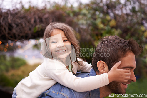 Image of Portrait, piggyback and playful with father and daughter in nature for bonding, laughing or affectionate. Smile, relax and happiness with man carrying young child in park for support, weekend or care