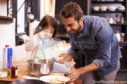 Image of Cooking, happy and breakfast for father with daughter in kitchen for pancakes, bonding or learning. Food, morning and helping with man and young girl in family home for baking, support and nutrition