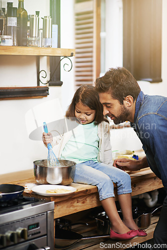 Image of Cooking, help and father with daughter in kitchen for pancakes, bonding and learning. Food, morning and breakfast with man and young girl in family home for baking, support and teaching nutrition