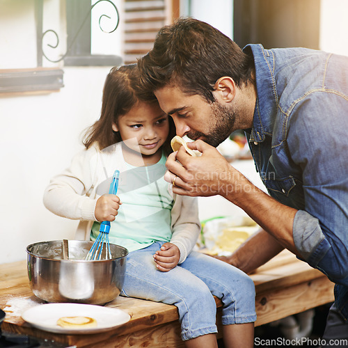 Image of Cooking, smell and father with daughter in kitchen for pancakes, bonding and learning. Food, morning and helping with man and young girl in family home for baking, support and teaching nutrition
