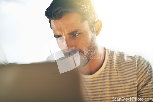 Image of Entrepreneur, laptop or face of man in cafe reading news online the stock market for trading report update. Coffee shop, remote work or serious trader typing an email or networking on digital website