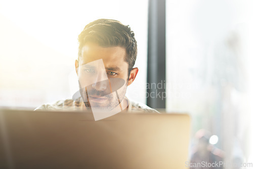 Image of Entrepreneur, laptop or man in cafe trading or reading news online the stock market for data analysis. Coffee shop, remote work or trader typing an email or networking on internet or digital website