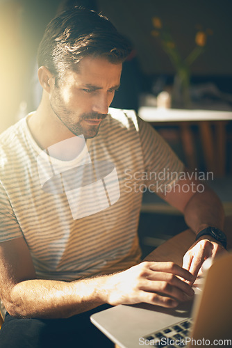 Image of Trader, laptop or man in coffee shop reading news online the stock market for trading report update. Cafe, remote work or entrepreneur typing an email or networking on internet or digital website