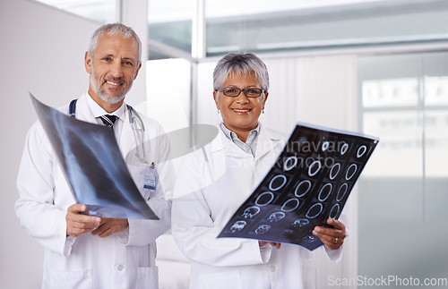 Image of Senior team of doctors in portrait with xray, people in radiology with healthcare and medical collaboration. Anatomy scan for surgery, old man and woman surgeon with smile, happy working together