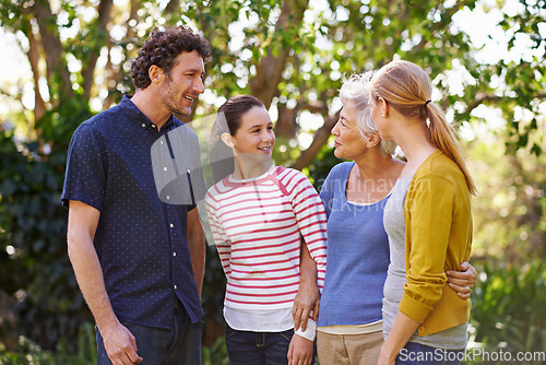 Image of Happy family, parents with kid and grandmother in nature, happiness and freedom outdoor in park together. Love, trust and support with people spending quality time outside with care and generations