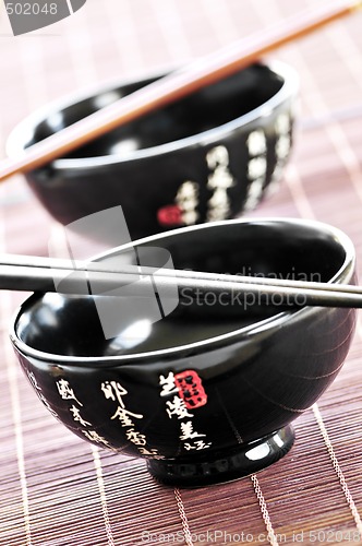Image of Rice bowls and chopsticks