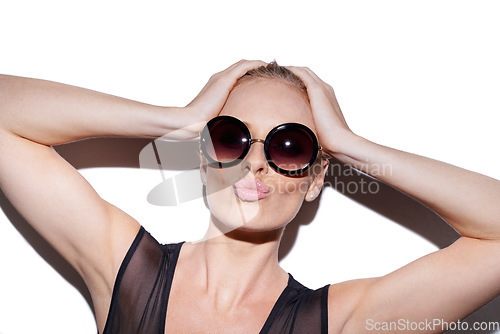 Image of Portrait, kiss and sunglasses or trendy woman for fashion in studio or skincare and isolated on white background. Face, stylish and female model for makeup or glamour or lipstick . and fish lips