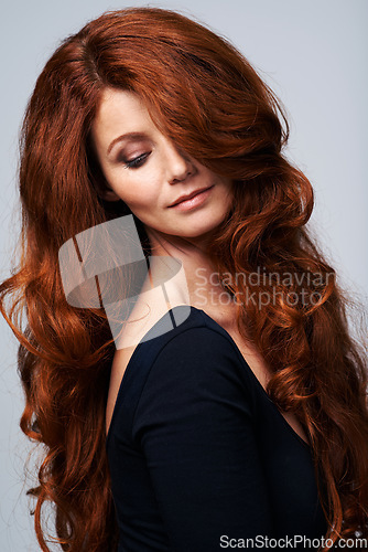 Image of Red head, hair and woman in studio with beauty for keratin treatment, wellness and haircare on white background. Salon, hairdresser and female model with texture shine, healthy and natural hairstyle