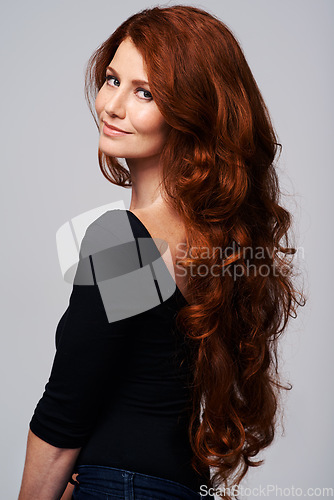 Image of Red head, hair care and portrait of woman for wellness, keratin treatment and haircare on white background. Beauty salon, hairdresser and ginger female model with shine, healthy and natural hairstyle