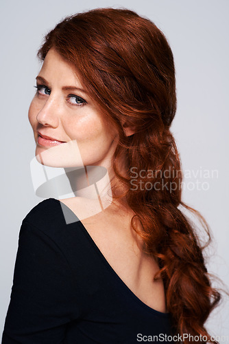 Image of Ginger, hairstyle and portrait of woman in studio for salon, hair care and cosmetology. Smile, red head and stylist with female model isolated on white background for haircut, makeup and cosmetics