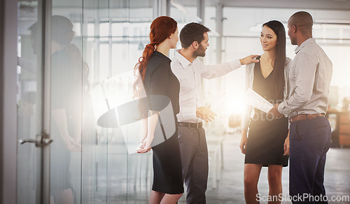 Image of Business people, group and discussion in office corridor with men, women or diversity for strategy at startup. Businessman, leader or talk with advice, teamwork and brainstorming for company goal