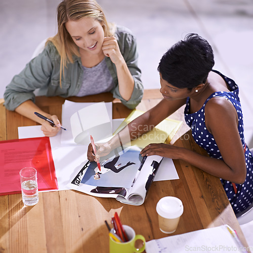 Image of Women in team strategy meeting at fashion magazine agency, conference room and collaboration. Diversity, top view and creative female employees working together, editorial ideas and brainstorming