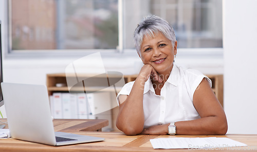 Image of Office, portrait and mature woman on laptop for career management, planning and working with professional mindset. Happy face of indian person, worker or business employee on computer in workplace