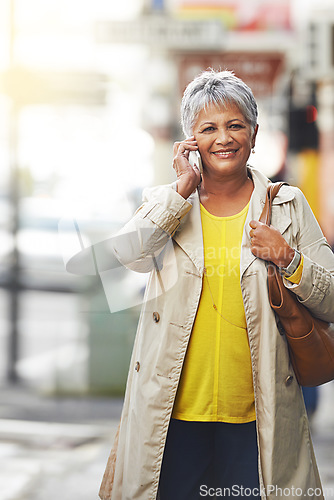 Image of Phone call, portrait and senior woman walking, travel or on urban city commute while talking on cellphone. Happy, conversation and elderly person consulting, networking or talk on mobile smartphone