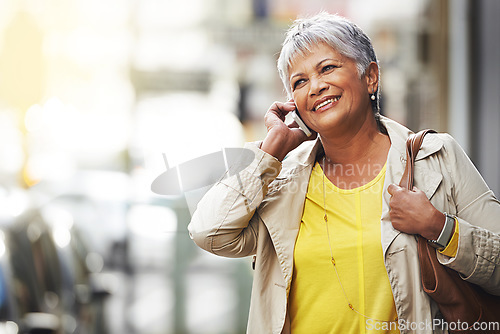 Image of Phone call, smile and elderly happy woman on urban commute, travel and talking to smartphone contact. City mock up, happiness and senior person consulting, speaking and walking on street sidewalk