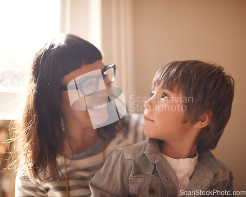 Image of Love, mother and son bonding, happiness and conversation at home, funny and laughing. Family, female parent and happy mama with a male child, boy and kid with joy, loving and relax in a living room