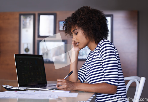 Image of Laptop, writing and woman with work from home budget, financial management and taxes paperwork at desk. Focus, research and calculator of african person on computer screen, notes or finance documents