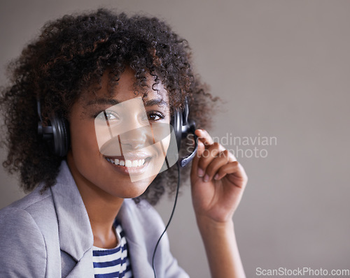 Image of Portrait, call center and African woman with headset and happy virtual communication, technical support or online chat. Professional agent, consultant or face of business person in telemarketing job