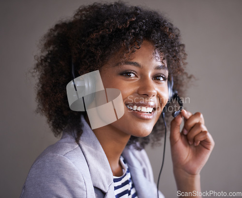 Image of Portrait, call center and consultant woman in headset for virtual communication, technical support or talking online. Professional agent or face of happy, African business person in telemarketing job