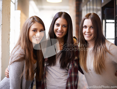 Image of University, education and portrait of women with smile ready for studying, class and learning together. Friendship, scholarship and happy female students in school, academy and college hallway