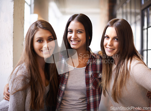 Image of Education, college and portrait of women with smile for studying, class and learning together on campus. Friendship, scholarship and happy female students in school, academy and university hallway