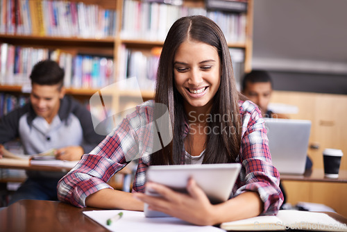 Image of University, tablet and woman in school library for online research, studying and learning. Education, college academy and happy female student on digital tech for knowledge, internet and website