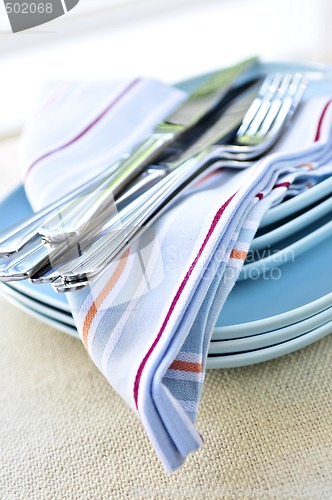 Image of Plates and cutlery