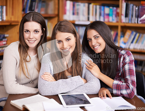Image of University, learning and portrait of women in library on tablet for online research, studying and project. Education, academy and happy female students on computer for knowledge, internet and website