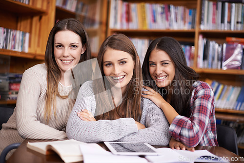 Image of University, friends and portrait of women in library for online research, studying and learning. Education, academy and happy female students with books for knowledge, internet and school project