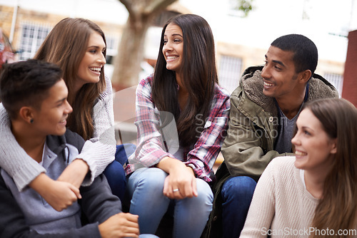 Image of University, community and people chat on campus in conversation, talking and laughing outdoors. Diversity, education and happy men and women students smile for learning at school, academy and college