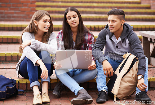 Image of University, students with laptop on campus steps and online education in college with diversity, results and group project. Learning, studying and friends with smile, internet and future opportunity.